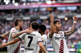 Exequiel Palacios celebrates scoring a penalty in Bayer Leverkusen's 5-1 win over Eintracht Frankfurt