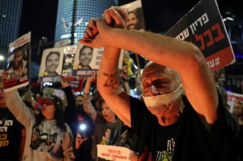 Relatives and supporters of hostages taken captive by Palestinian militants in Gaza demonstrate in Tel Aviv