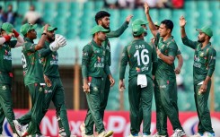 Bangladesh players celebrate during the third Twenty20 international cricket match against Zimbabwe in Chittagong