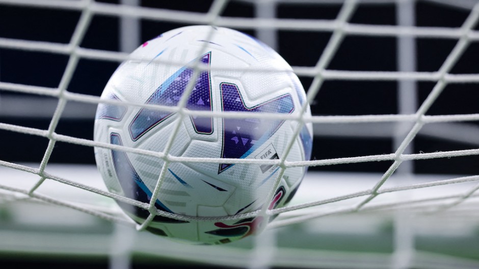 File: A soccer ball hitting a net. AFP/Fabrizio Carabelli/LiveMedia/NurPhoto