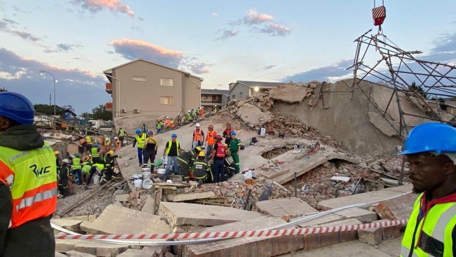 Workers busy at the George Building Collapse