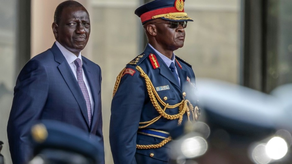 Kenyan President William Ruto (left) appointed General Francis Omondi Ogolla as defence chief a year ago 