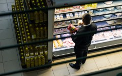 Lifestyle A buyer takes a cease watch at costs while searching in a grocery retailer. AFP/Jekesai Njikizana
