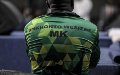 A man wearing a Umkhonto Wesizwe (MK) political party shirt. AFP/Gianluigi Guercia