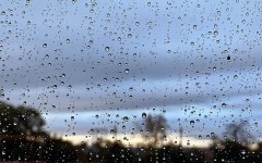 File: Raindrops seen on a window. eNCA/Estelle Bronkhorst