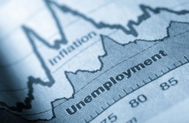 A folded sheet of paper with an unemployment graph on. Getty Images/JL Gutierrez