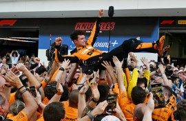 McLaren's Lando Norris is tossed in the air as his team celebrates victory at the Miami Grand Prix on Sunday