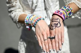 Taylor Swift fans are adorned with Swiftie friendship bracelets 