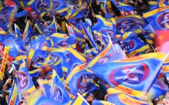 Stormers' supporters wave flags.