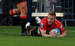 Canterbury Crusaders winger Johnny McNicholl scored two tries in Friday night's win over the Waikato Chiefs in Christchurch