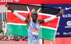 Kenya's Kelvin Kiptum won the Chicago Marathon in a world record time of two hours and 35 seconds 