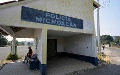 An abandoned, bullet-pocked police post is seen in the Mexican town of Maravatio