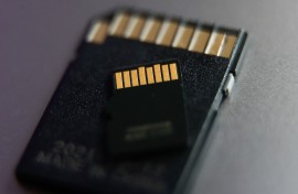 File: MicroSD card and an adapter are seen in this illustration photo. Jakub Porzycki/NurPhoto via AFP