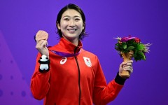 Rikako Ikee celebrates a bronze medal for the women's 50m butterfly at the Asian Games in Hangzhou last year