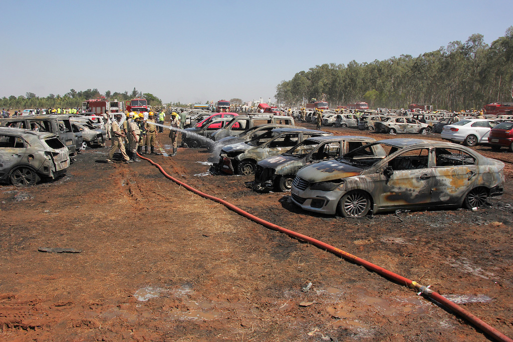 Image result for burned out cars parking lot