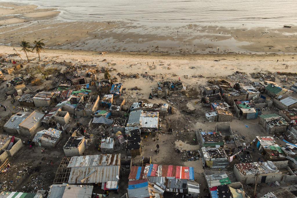File: Debris and destroyed buildings which stood in the path of Cyclone Idai can be seen in this aerial photograph over the Praia Nova neighbourhood in Beira.