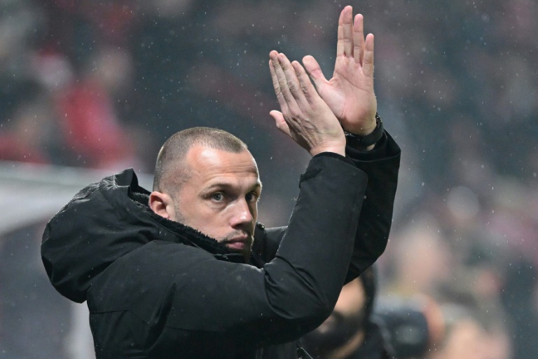 Ajax seek new coach after releasing Heitinga - Vimarsana News
