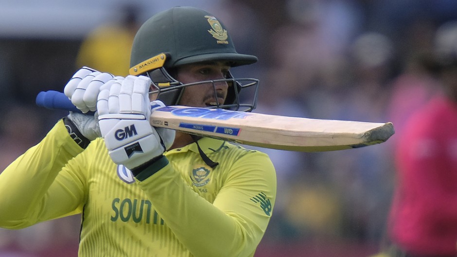 Quinton de Kock of South Africa looks on as he looses his wicket.