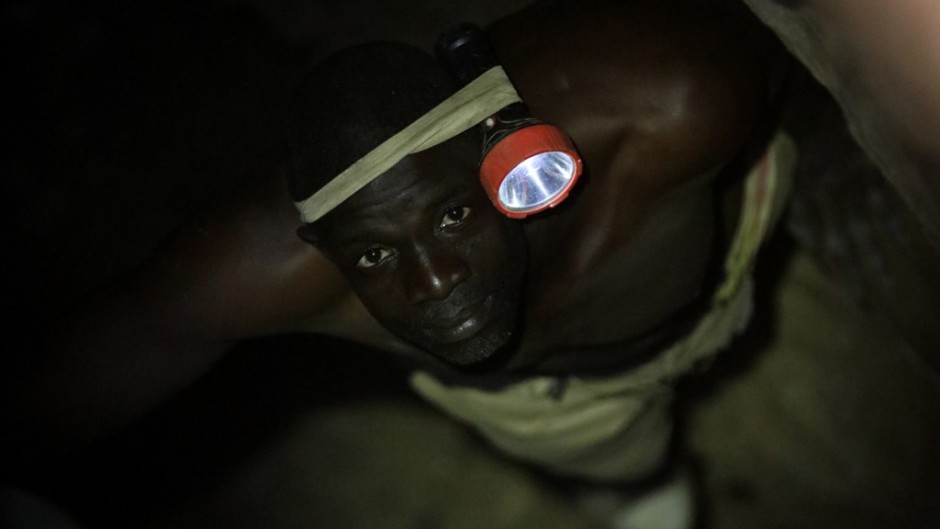 FILE: A gold miner works underground in Anka near Gusau, on December 4,2019. For generations, the mineral-rich earth of Nigeria's Zamfara state has provided families living here with a way to make ends meet.