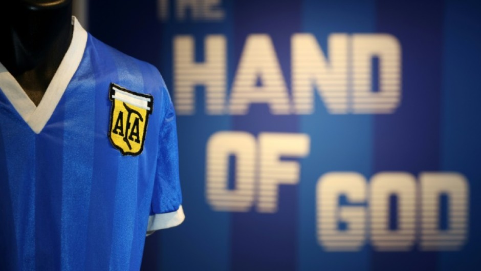 A football shirt worn by Argentina's Diego Maradona during the 1986 World Cup quarter-final match against England is seen at Sotheby's auction house in London in April ahead of its sale for $9.3 million May 4, 2022