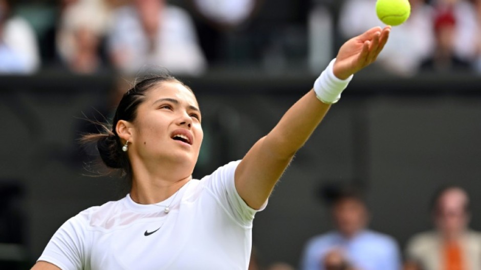 Emma Raducanu serves during her defeat to Caroline Garcia in the second round at Wimbledon