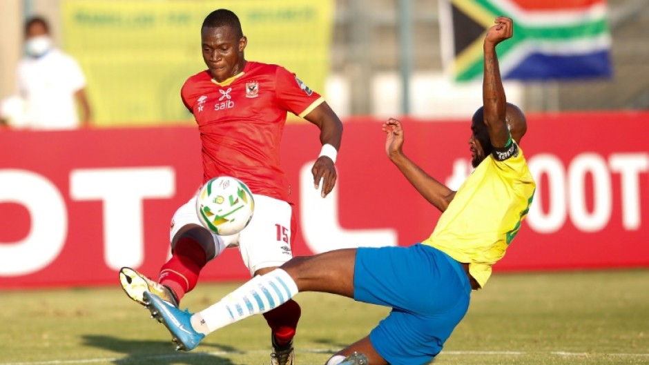 South Africa defender Mosa Lebusa (R) conceded an own goal in a 4-1 home defeat by Angola in an African Nations Championship qualifier