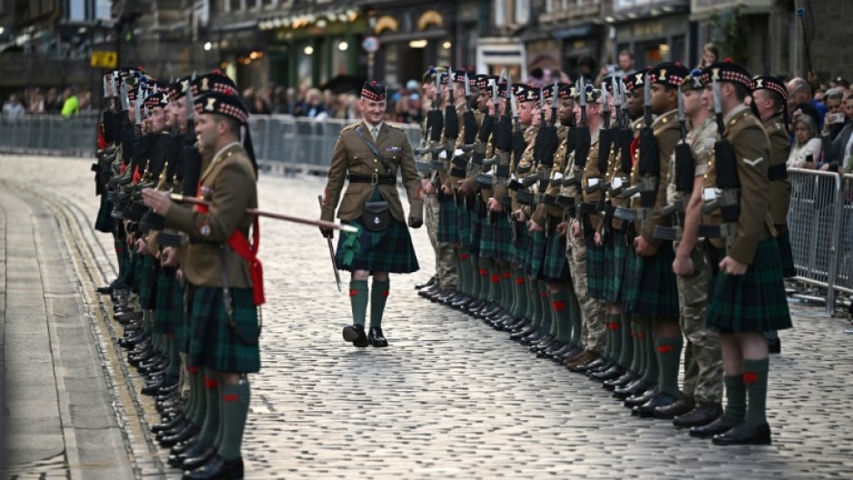 The new king will accompany his mother's coffin in procession along the Royal Mile to the magnificent St Giles' Cathedral in Edinburgh