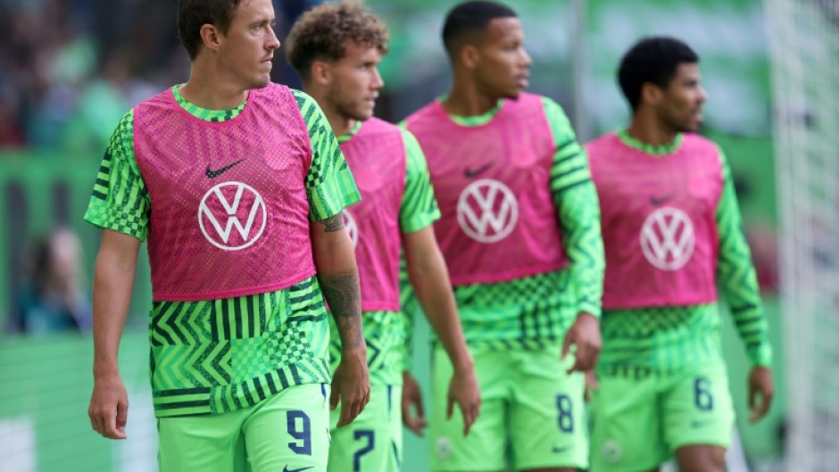 Wolfsburg's German forward Max Kruse (L) has been told his days are over at the club. 