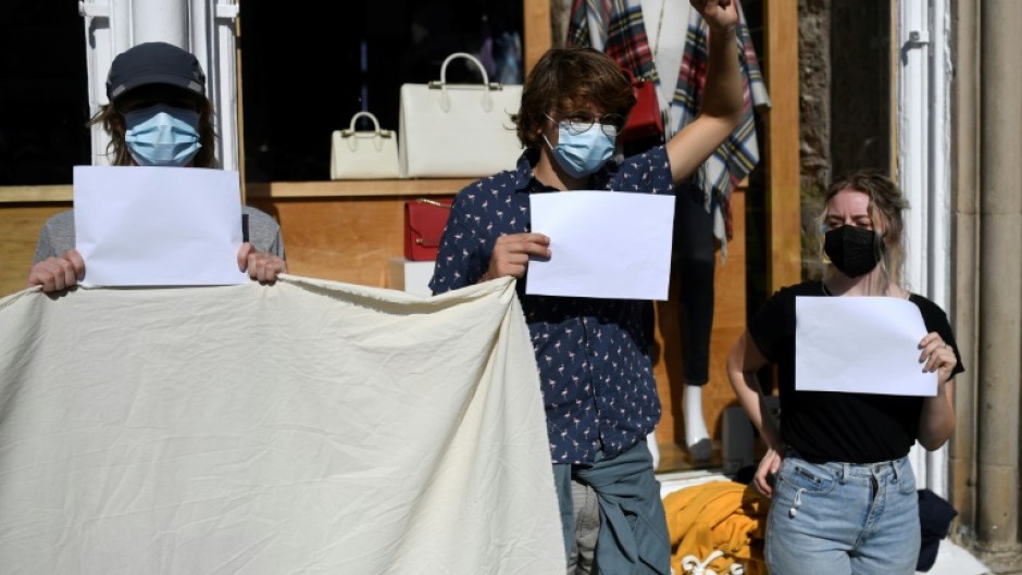 Some people protested with blank pieces of paper in Edinburgh