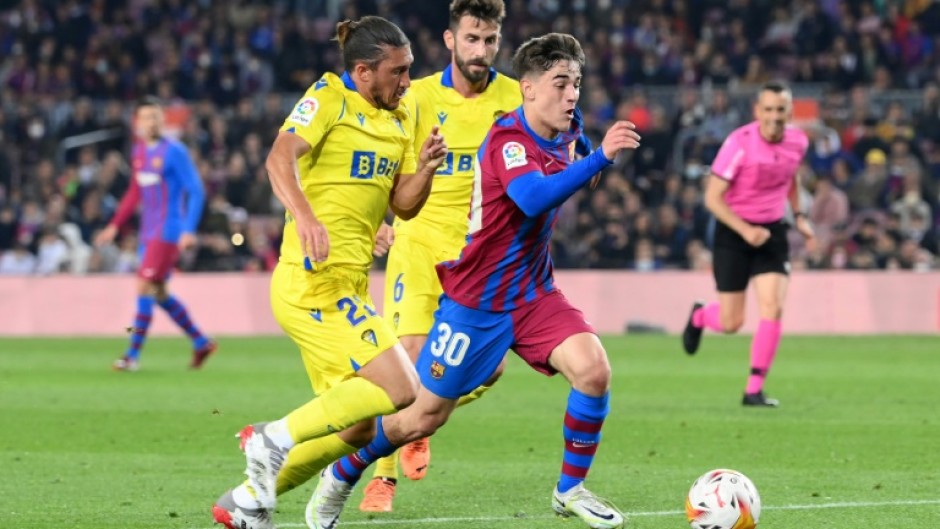 Gavi (R) has already made 54 appearances for the Barcelona first team