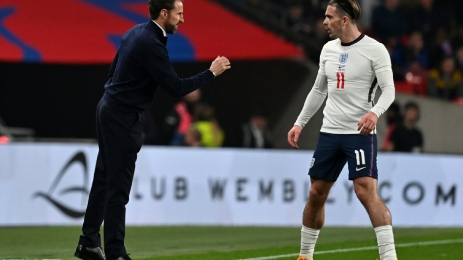 England manager Gareth Southgate gives instructions to Jack Grealish