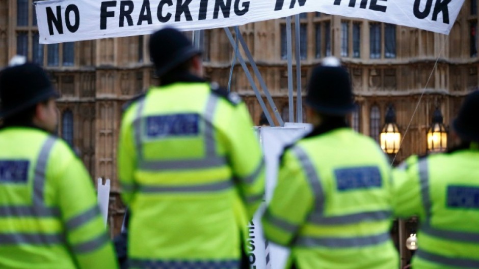 Protestors erected a mock gas fracking rig in front of Britain's Houses of Parliament in 2012
