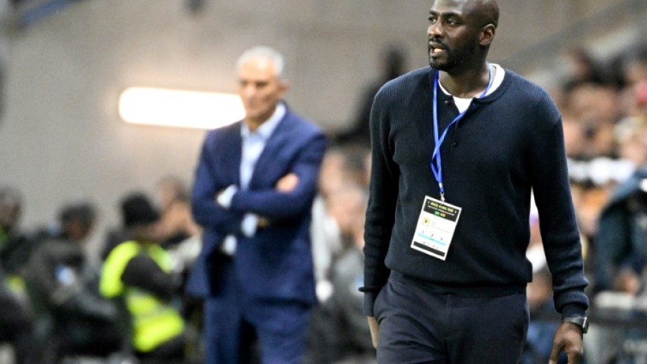 Ghana coach Otto Addo (R) has a contract that runs until the end of this year's World Cup