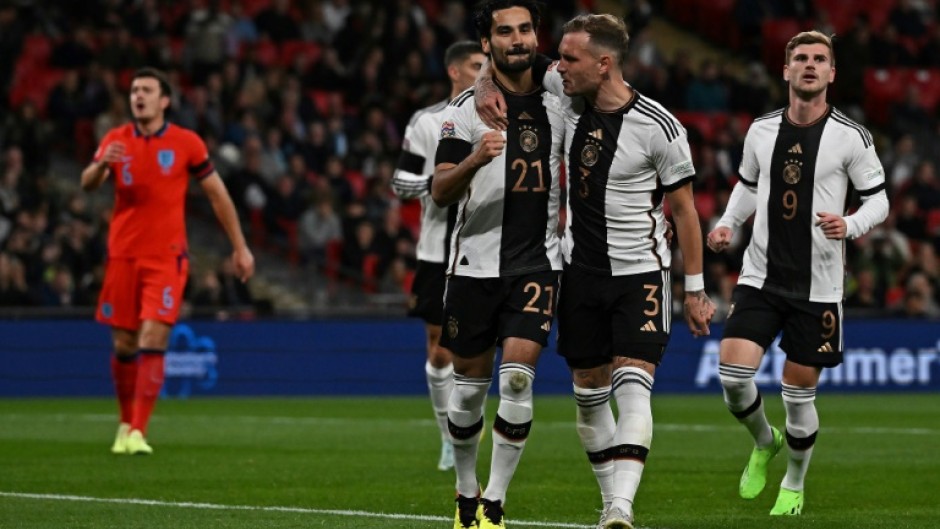Harry Maguire's (left) place in the England team at the World Cup is under even more scrutiny after two mistakes led to German goals
