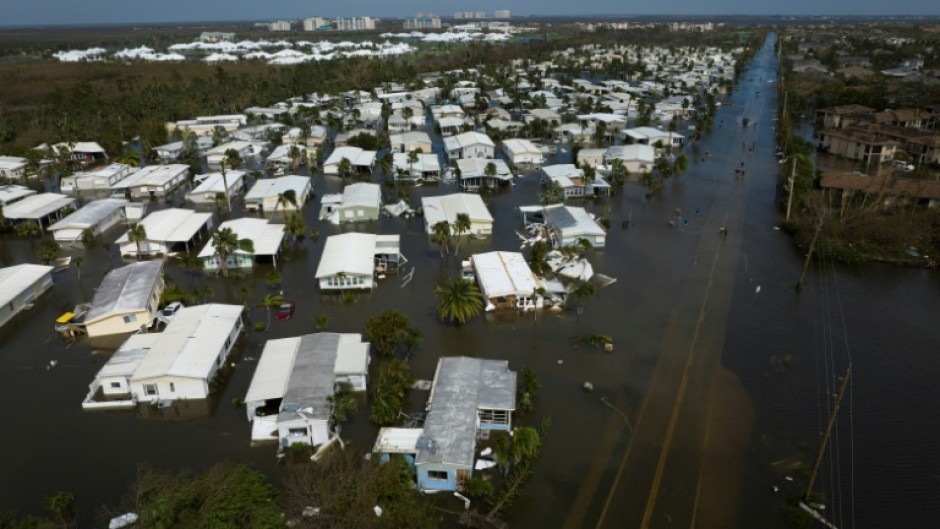 Hurricane Ian left much of coastal southwest Florida in darkness early on Thursday
