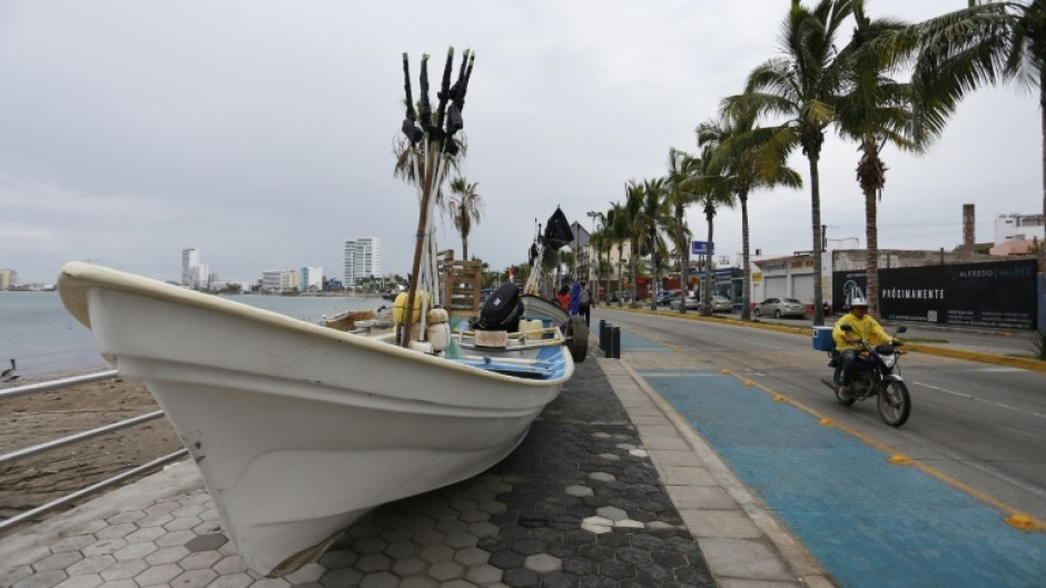 Boats were brought ashore ahead of the arrival of Hurricane Orlene on Mexico's Pacific coast