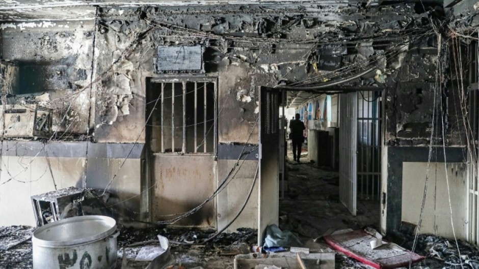 A picture obtained from the Iranian Mizan News Agency on October 16, 2022 shows damage caused by a fire in the Evin prison, northwest of the Iranian capital Tehran