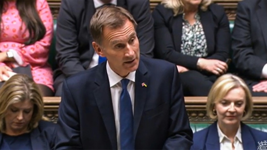 New finance minister Hunt told parliament Truss had agreed to reverse almost all the tax measures announced three weeks ago as the grim faced premier looked on