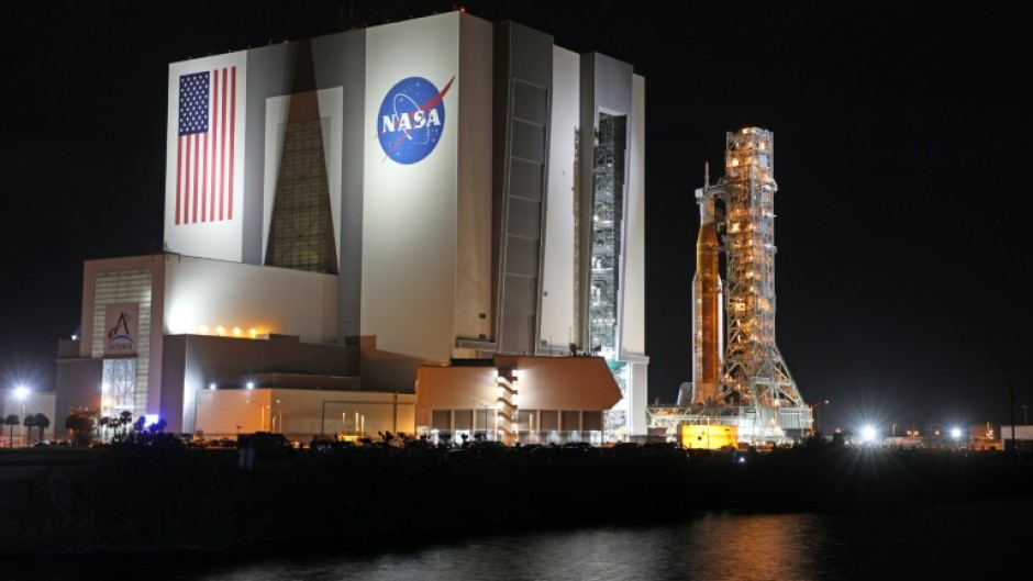 The Artemis-1 rocket is rolled out from the Vehicle Assembly Building en route to Launch Pad 39B at the Kennedy Space Center in Florida