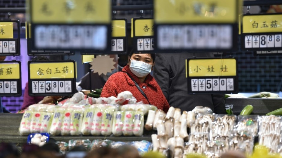 Deepening the economic pain is Beijing's insistence on maintaining its strict policy of snap lockdowns and travel curbs whenever Covid cases arise