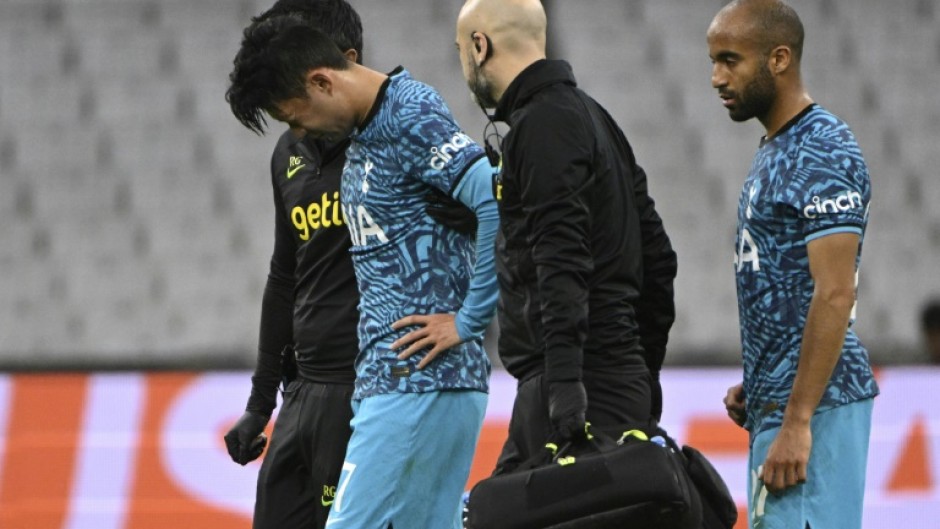 Son Heung-Min (left) is to undergo facial surgery just over three weeks before the World Cup begins