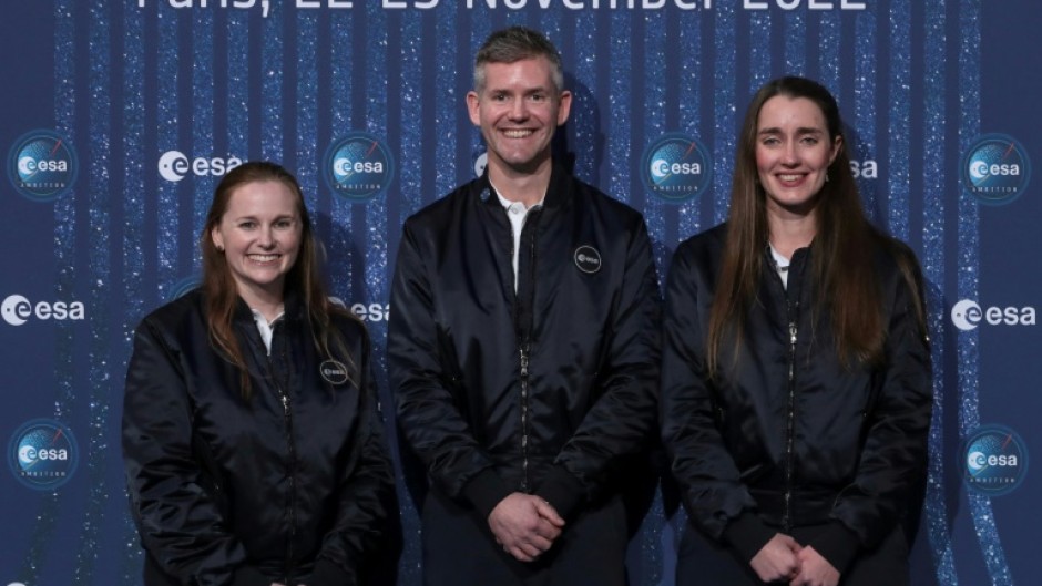 UK's Rosemary Coogan, right, is one of the ESA's new career astronauts, while Paralympian doctor John McFall, centre, became the first recruit with a disability