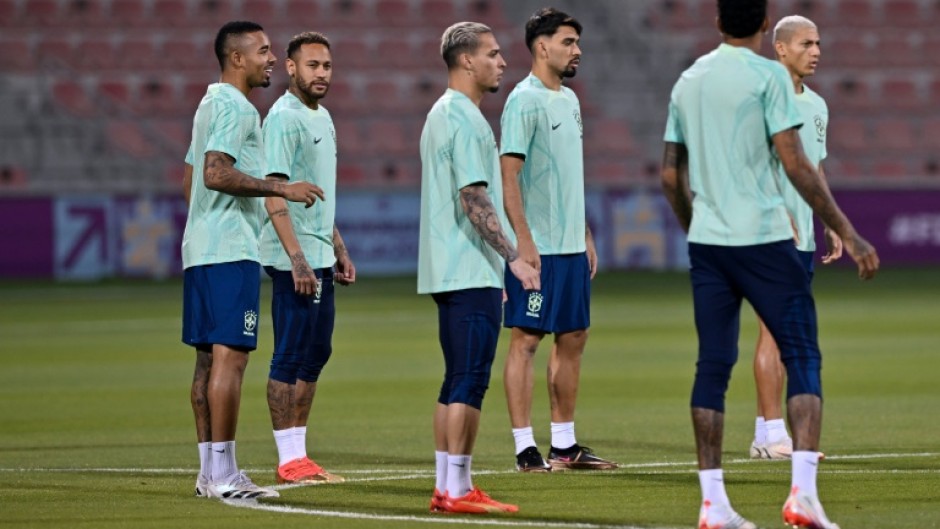 Neymar (2nd L) with his Brazil teammates at training in Doha on Wednesday