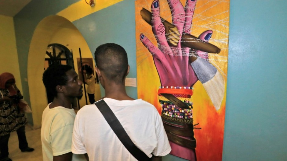 Sudanese visit a Rastafarian art exhibition in the capital Khartoum
