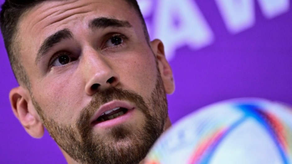 Spain goalkeeper Unai Simon reacts at a press conference at the Qatar National Convention Center