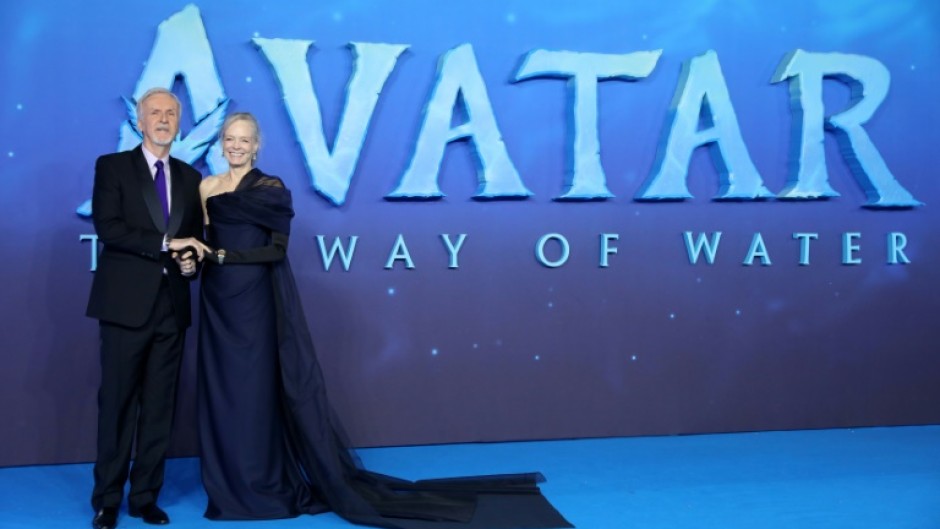 Canadian filmmaker James Cameron and Suzy Amis Cameron pose on the red carpet at the world premiere of 'Avatar: The Way of Water'