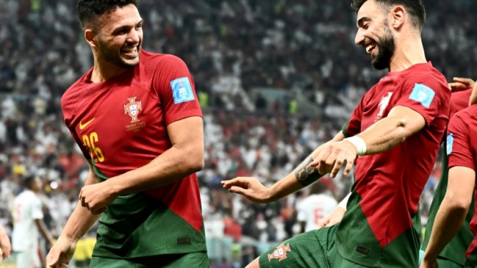 Goncalo Ramos (left) scored a hat-trick as Portugal beat Switzerland 6-1 at the World Cup