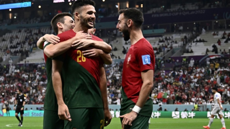Portugal forward Goncalo Ramos (front) celebrates with team-mates after scoring against Switzerland