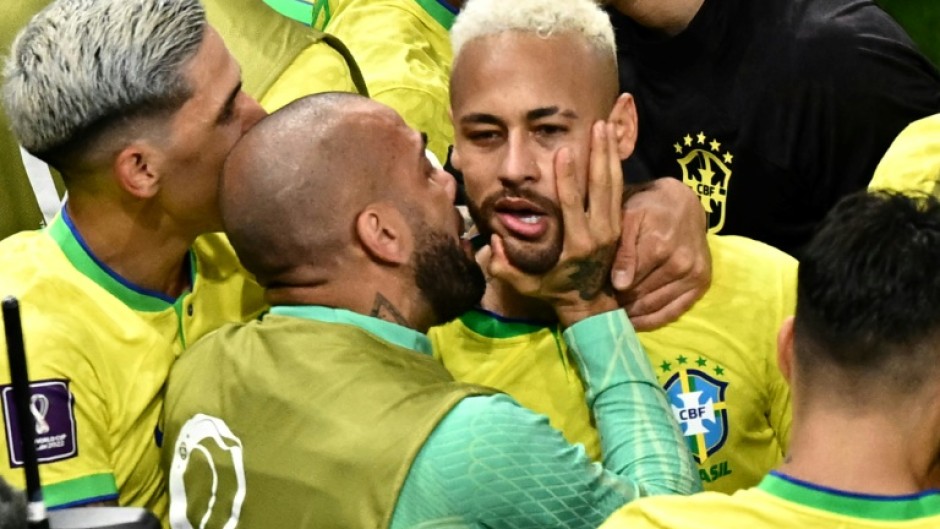 Brazil striker celebrates after scoring the 77th international goal of his career, matching Pele's Brazilian record