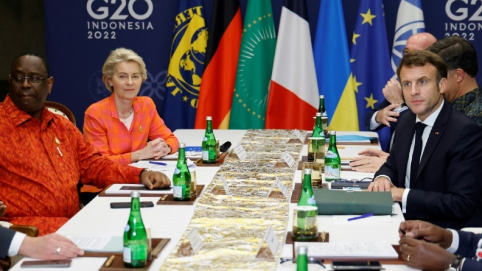 Senegalese President Macky Sall, the current chair of the African Union, takes part in a Group of 20 meeting in Bali, Indonesia in November 2022 with French President Emmanuel Macron and European Commission President Ursula von der Leyen 
